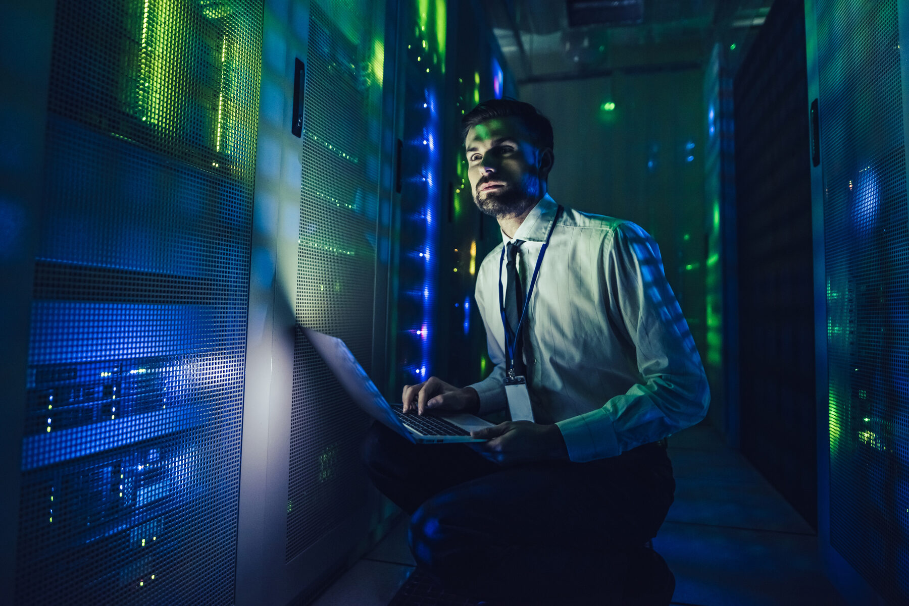 Engineer working in a live data hall